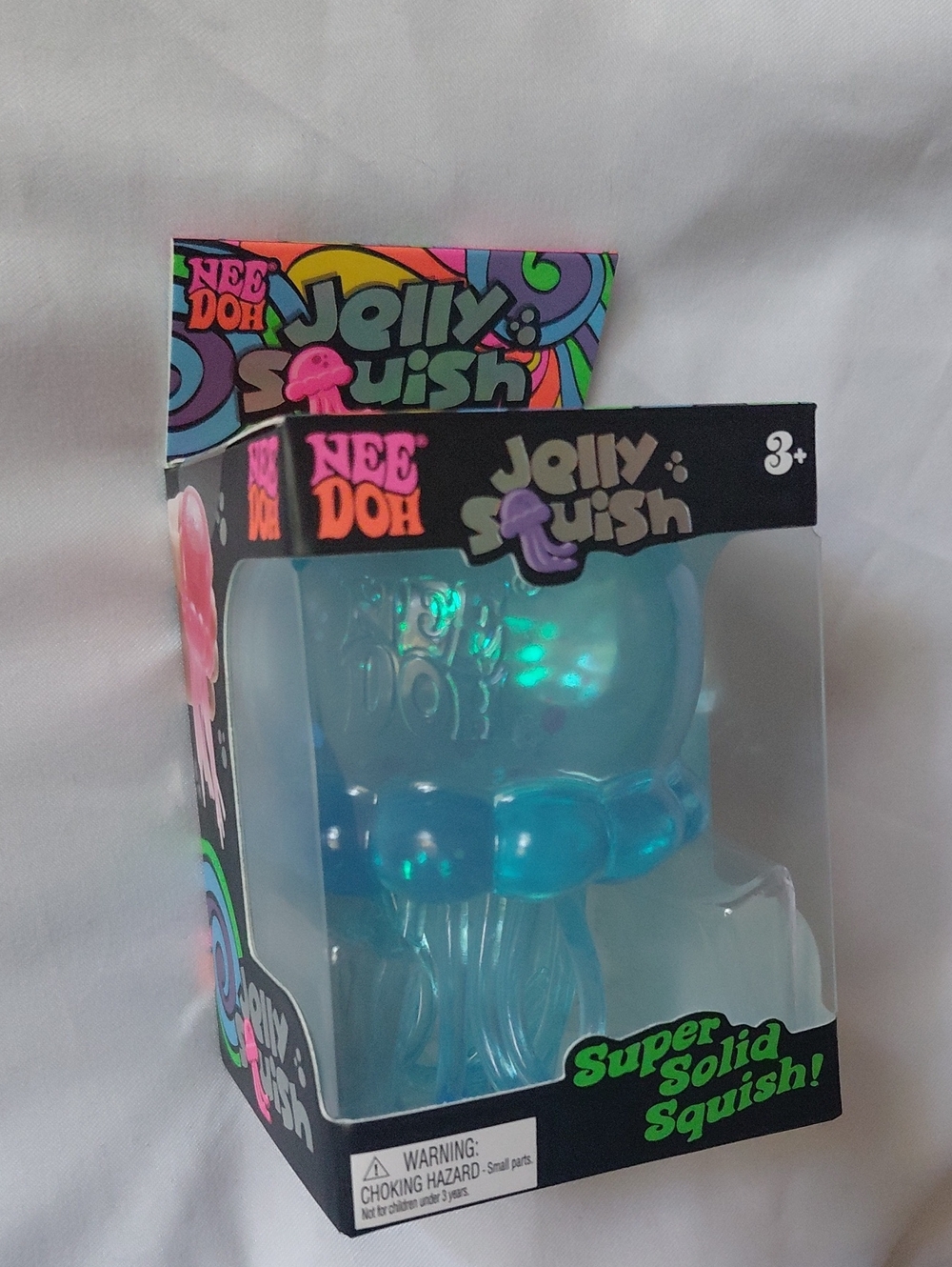 Schylling NeeDoh Jelly Squish Blue Glitter